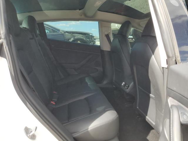 Photo 10 from auction – 2021 TESLA MODEL 3 with VIN 5YJ3E1EAXMF020608