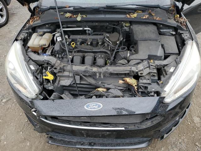 Photo 11 from auction – 2015 FORD FOCUS SE with VIN 1FADP3F23FL253138