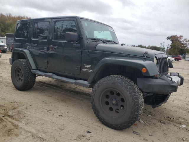 Снимка 4 от търг – 2011 JEEP WRANGLER U с VIN 1J4BA5H16BL557068