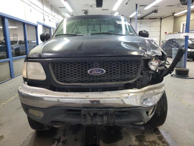 Foto 5 de la subasta – 2000 FORD F150 con VIN 1FTRX18L5YNA29872