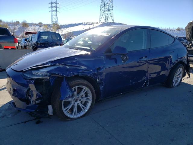 TESLA MODEL Y 2022 with VIN 7SAYGDEE0NA014788 - Photo from auction