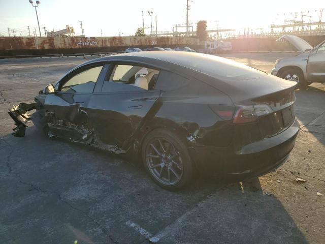 Снимка 2 от търг – 2021 TESLA MODEL 3 с VIN 5YJ3E1EB4MF068131