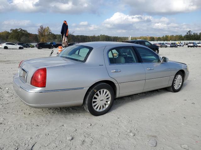 Photo 3 from auction – 2004 LINCOLN TOWN CAR U with VIN 1LNHM83W84Y613024