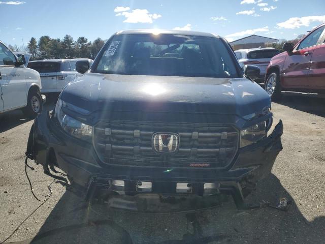 Photo 5 from auction – 2024 HONDA RIDGELINE with VIN 5FPYK3F16RB029541