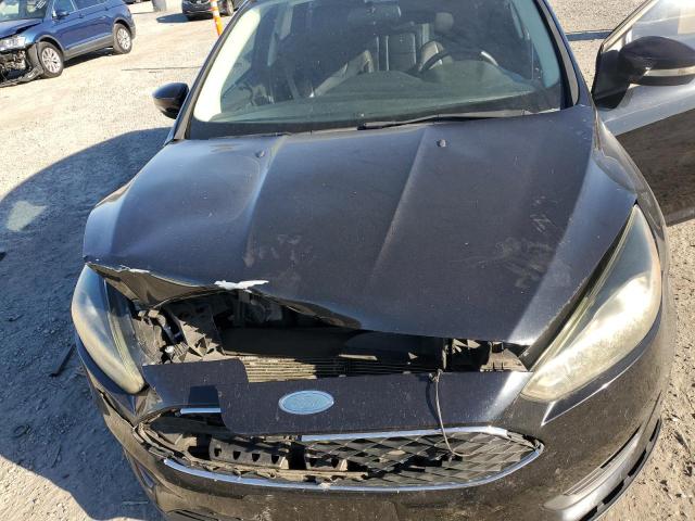 Photo 11 from auction – 2016 FORD FOCUS SE with VIN 1FADP3K23GL389602