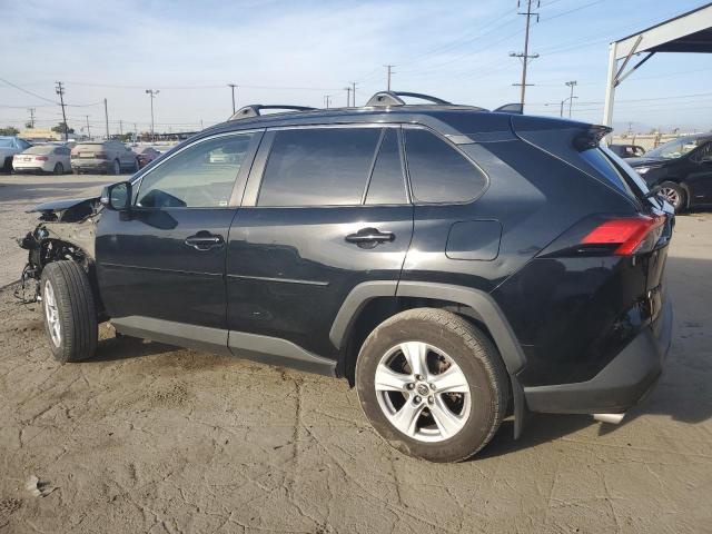 Photo 2 from auction – 2019 TOYOTA RAV4 XLE with VIN JTMW1RFV0KD504347