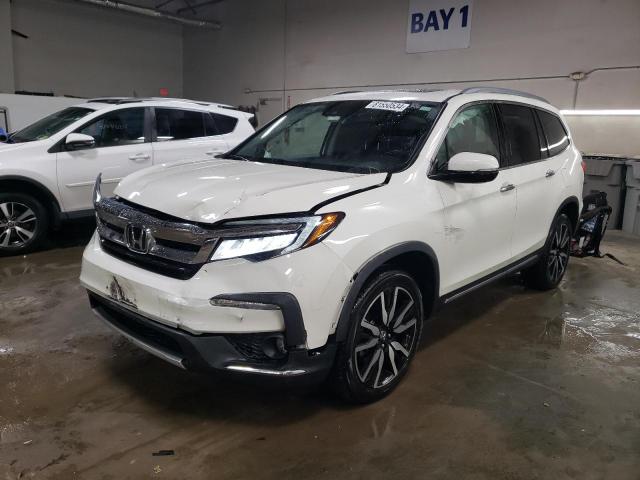 HONDA PILOT ELIT 2019 with VIN 5FNYF6H07KB007282 - Photo from auction