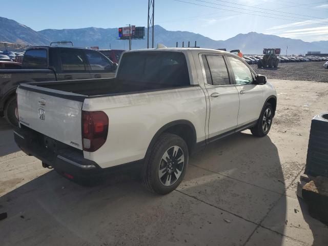 Photo 3 from auction – 2020 HONDA RIDGELINE with VIN 5FPYK3F57LB025699