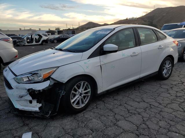 FORD FOCUS SE 2018 مع رقم تعريف المركبة 1FADP3FE7JL270611 - صورة من المزاد
