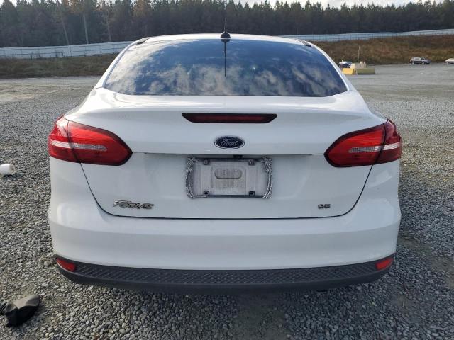 Фото 6 с аукциона – 2018 FORD FOCUS SE с VIN 1FADP3F26JL214813