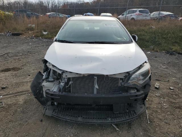 Photo 5 from auction – 2014 TOYOTA COROLLA L with VIN 5YFBURHE1EP132926