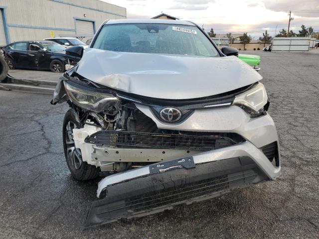 Photo 5 from auction – 2018 TOYOTA RAV4 LE with VIN 2T3ZFREV4JW509181