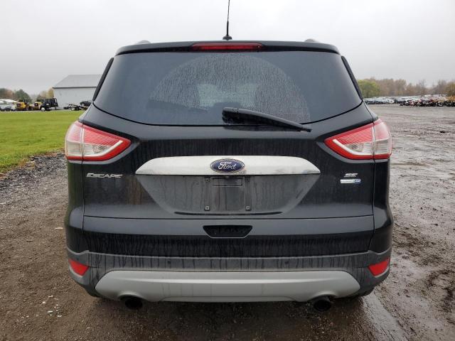 Photo 6 from auction – 2014 FORD ESCAPE SE with VIN 1FMCU9G94EUC73853