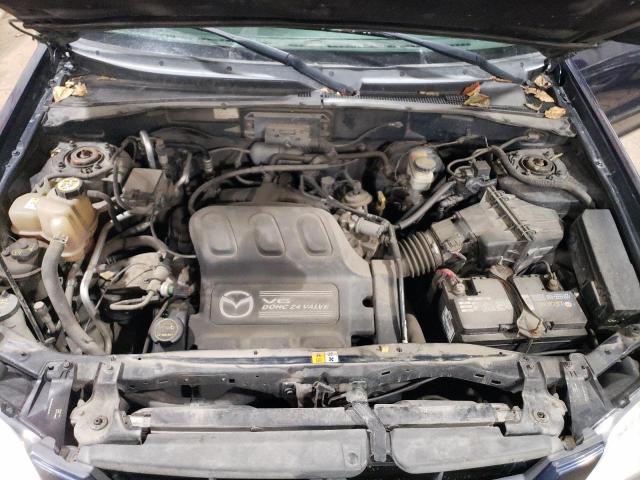 Photo 12 from auction – 2003 MAZDA TRIBUTE ES with VIN 4F2CZ96143KM46457