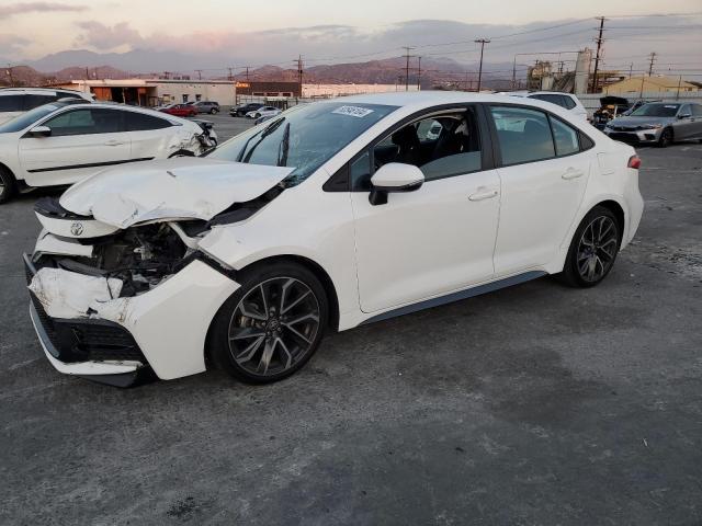 TOYOTA COROLLA SE 2020 with VIN 5YFS4RCE2LP048215 - Photo from auction