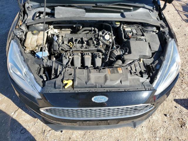 Photo 12 from auction – 2016 FORD FOCUS SE with VIN 1FADP3F24GL368977