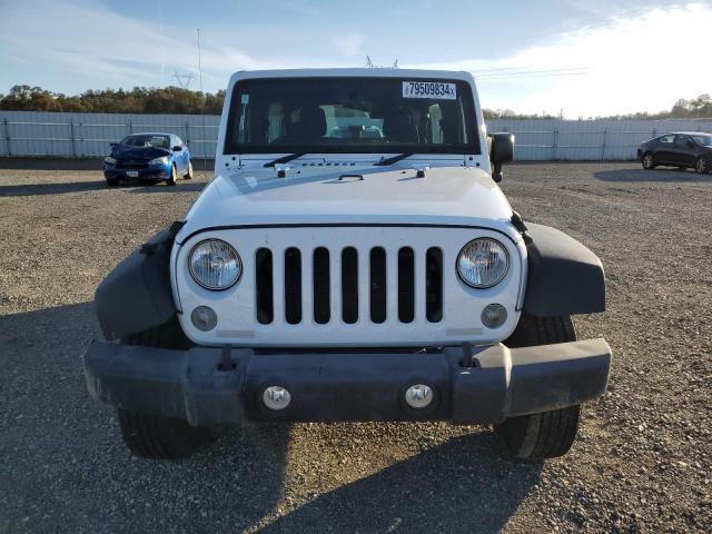 Photo 5 from auction – 2015 JEEP WRANGLER U with VIN 1C4BJWKGXFL680242