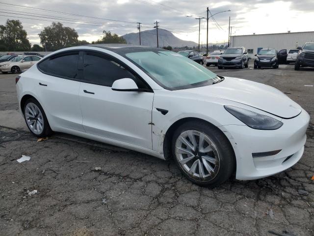 Photo 4 from auction – 2021 TESLA MODEL 3 with VIN 5YJ3E1EA0MF019158