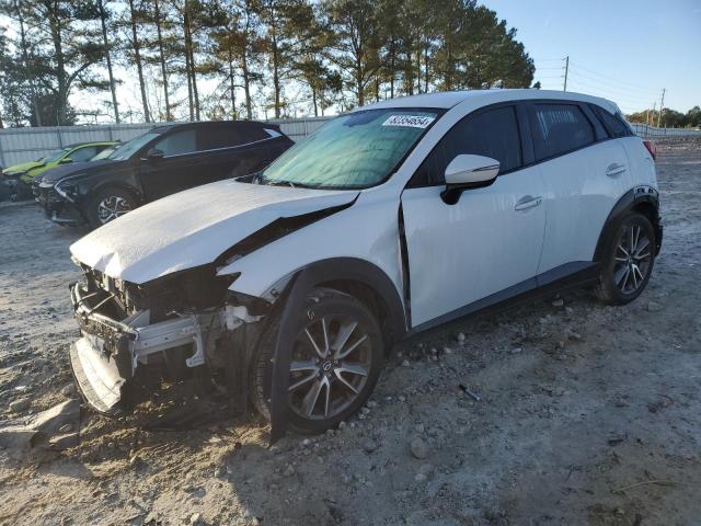 MAZDA CX-3 TOURI 2017 with VIN JM1DKDC7XH0145053 - Photo from auction