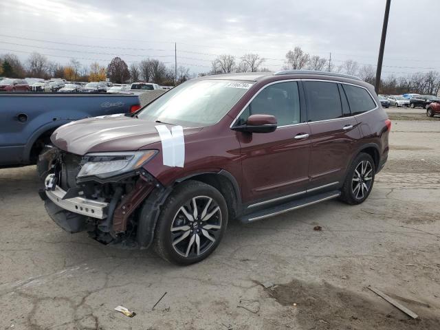 HONDA PILOT TOUR 2020 with VIN 5FNYF6H63LB004207 - Photo from auction