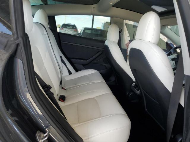 Photo 11 from auction – 2022 TESLA MODEL 3 with VIN 5YJ3E1EA6NF152704