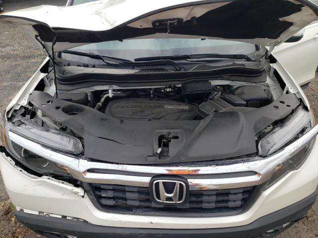 Photo 11 from auction – 2017 HONDA RIDGELINE with VIN 5FPYK2F45HB010594