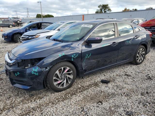 HONDA CIVIC EX 2017 with VIN 19XFC2F74HE034625 - Photo from auction