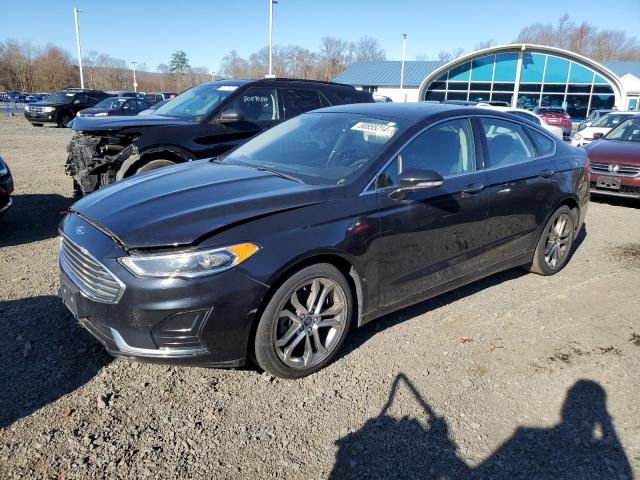 FORD FUSION SEL 2019 with VIN 3FA6P0CD2KR149913 - Photo from auction