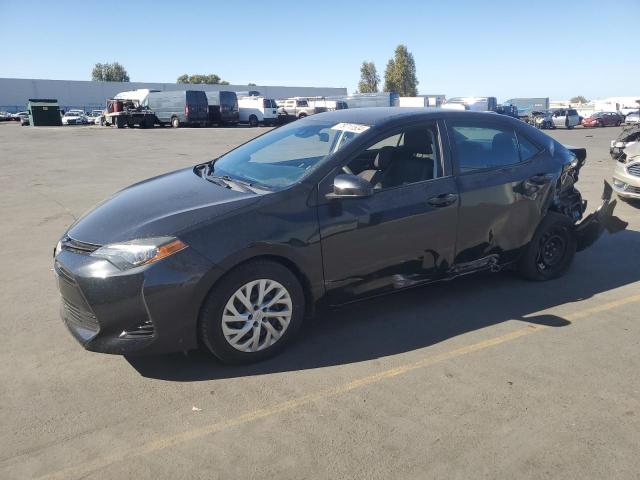 TOYOTA COROLLA L 2017 with VIN 5YFBURHE3HP698459 - Photo from auction