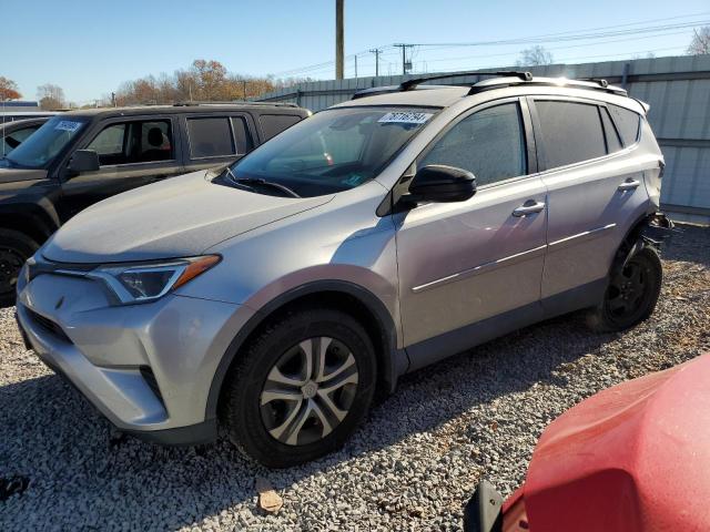 TOYOTA RAV4 LE 2018 with VIN 2T3BFREV2JW722728 - Photo from auction