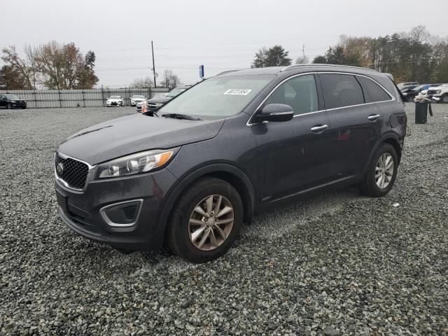 KIA SORENTO LX 2016 with VIN 5XYPGDA37GG025153 - Photo from auction