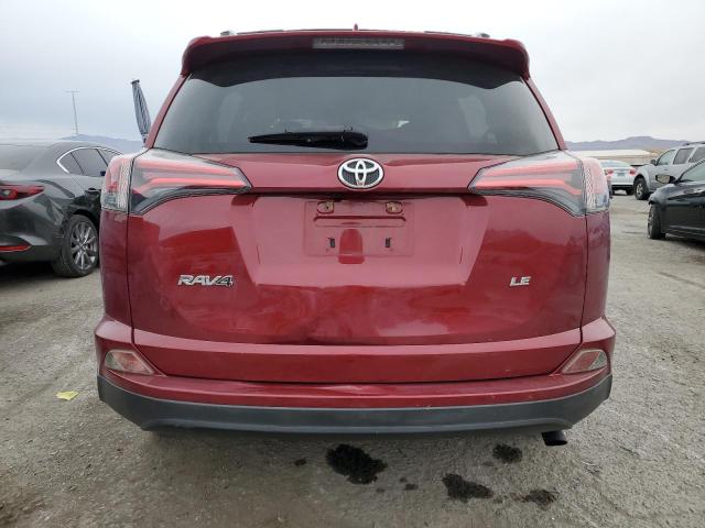 Photo 6 from auction – 2018 TOYOTA RAV4 LE with VIN JTMZFREV4JD119839