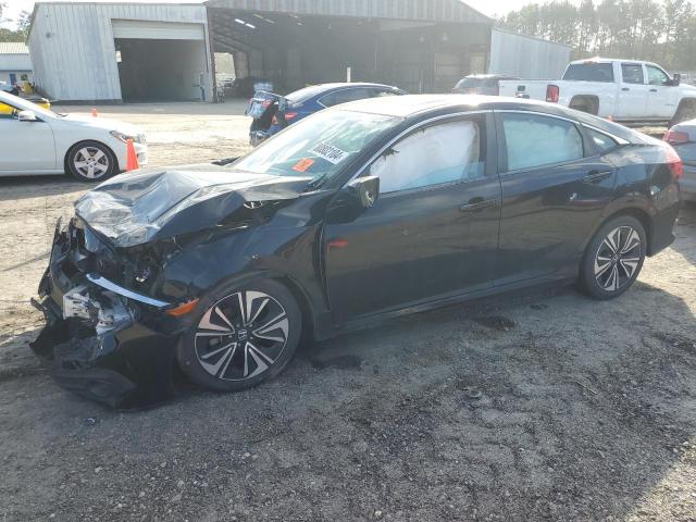HONDA CIVIC EX 2017 with VIN 19XFC1F34HE001938 - Photo from auction