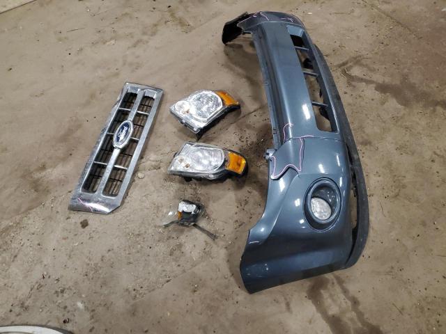 Photo 13 from auction – 2011 FORD ESCAPE XLT with VIN 1FMCU0D74BKB89604