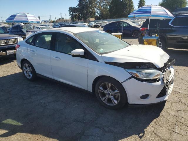 Foto 4 de la subasta – 2014 FORD FOCUS SE con VIN 1FADP3F2XEL432209