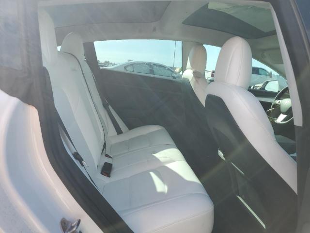 Photo 10 from auction – 2022 TESLA MODEL 3 with VIN 5YJ3E1EB7NF200073