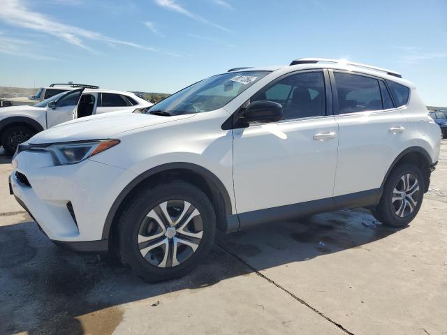 TOYOTA RAV4 LE 2017 with VIN JTMZFREV4HJ703976 - Photo from auction
