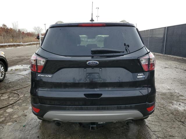 Photo 6 from auction – 2018 FORD ESCAPE SEL with VIN 1FMCU9HD6JUD56858
