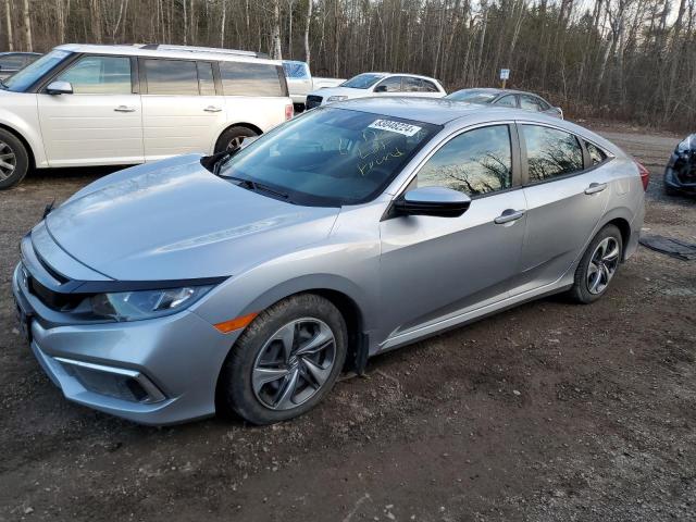 HONDA CIVIC LX 2021 with VIN 2HGFC2F57MH006302 - Photo from auction