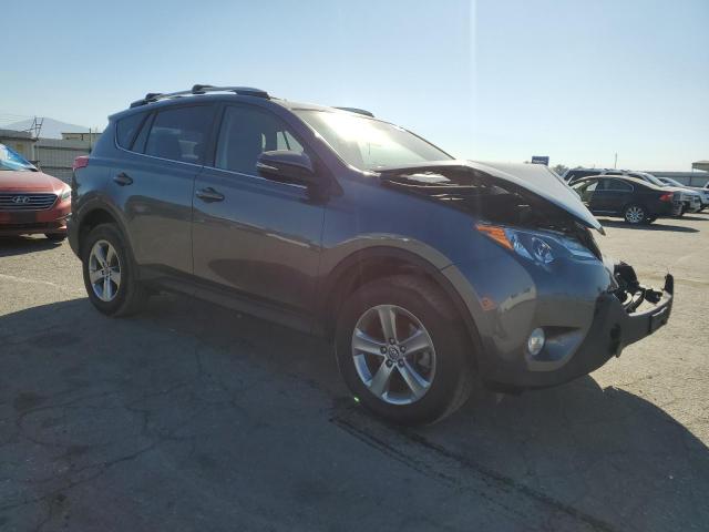 Photo 4 from auction – 2015 TOYOTA RAV4 XLE with VIN JTMWFREV2FD080095