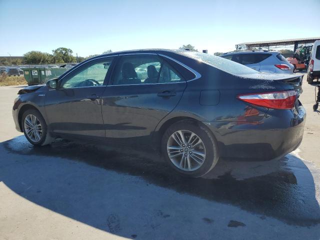 Photo 2 from auction – 2015 TOYOTA CAMRY HYBR with VIN 4T1BD1FK7FU154584