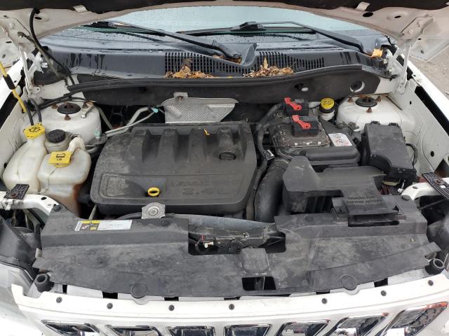 Photo 12 from auction – 2014 JEEP COMPASS LA with VIN 1C4NJCEB2ED518268