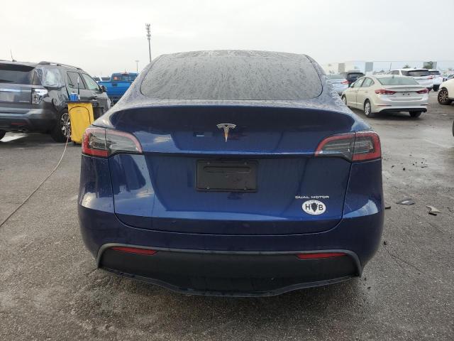 Photo 6 from auction – 2023 TESLA MODEL Y with VIN 7SAYGAEE3PF842256