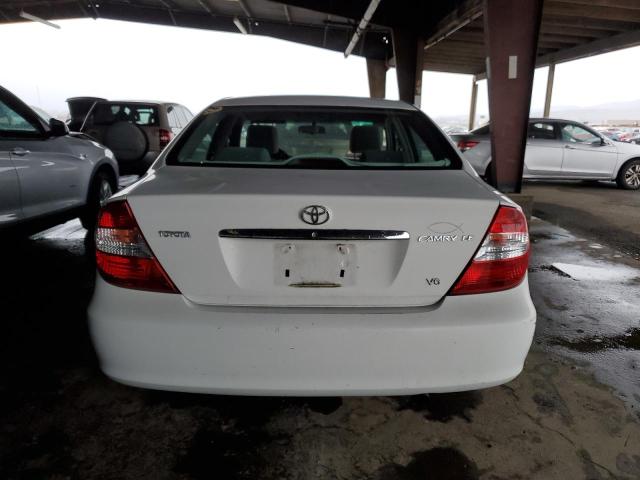 Photo 6 from auction – 2004 TOYOTA CAMRY LE with VIN 4T1BF30K84U064310