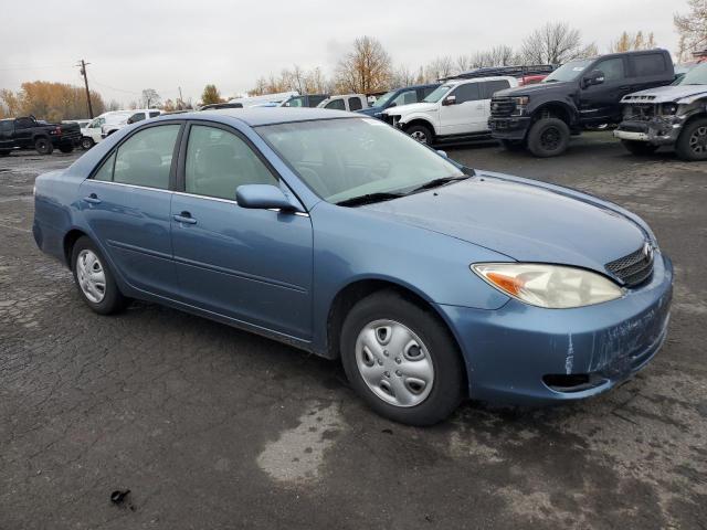Photo 4 from auction – 2002 TOYOTA CAMRY LE with VIN JTDBE32K820127690