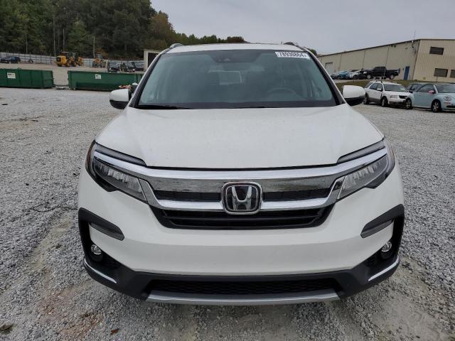 Photo 5 from auction – 2022 HONDA PILOT ELIT with VIN 5FNYF6H07NB074730