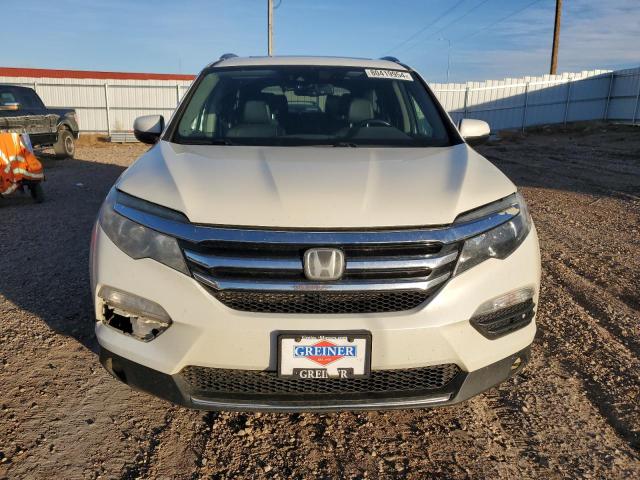Photo 5 from auction – 2017 HONDA PILOT ELIT with VIN 5FNYF6H05HB098917