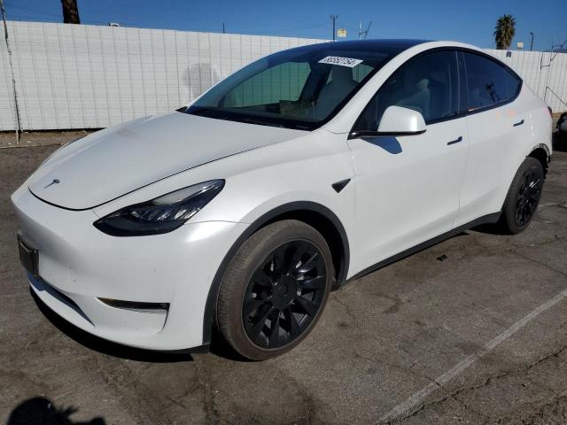 TESLA MODEL Y 2022 with VIN 7SAYGDEE2NF402169 - Photo from auction
