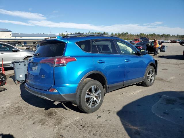 Photo 3 from auction – 2017 TOYOTA RAV4 XLE with VIN JTMRFREV9HJ142688