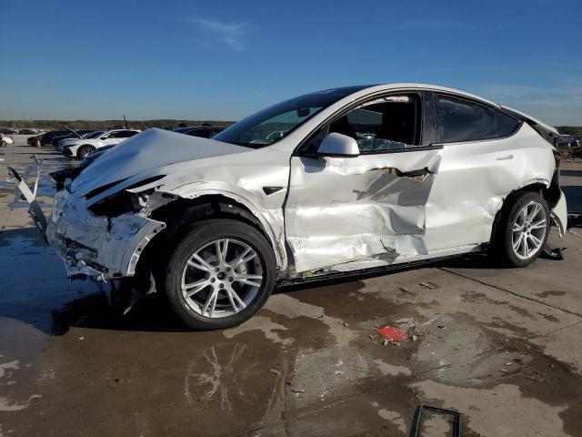 TESLA MODEL Y 2023 with VIN 7SAYGDEE6PF612468 - Photo from auction